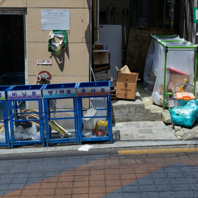 Street recycling bins in Seoul labelled for plastic, vinyl, glass and paper