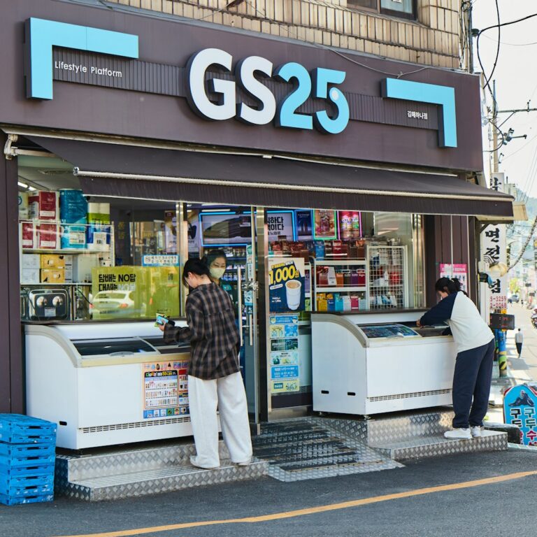 People walking into a GS25 convenience store in Korea